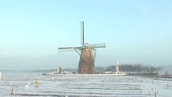Windmill of square wrapped in snow, morning sun and morning mist-4
